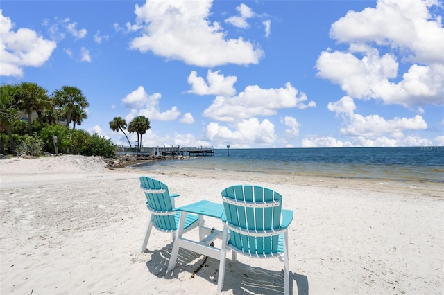 view of property's community featuring a view of the beach and a water view