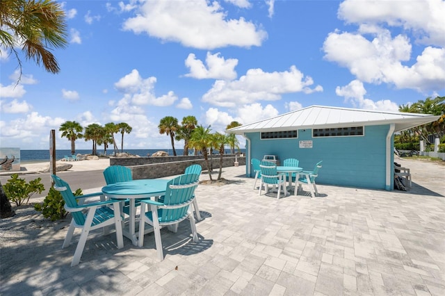 view of patio / terrace featuring a water view