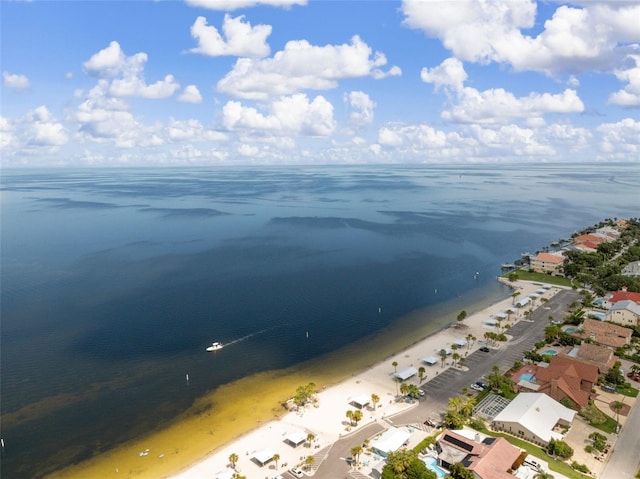 drone / aerial view with a view of the beach and a water view