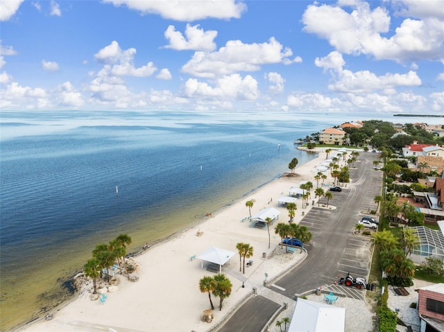 bird's eye view with a water view and a view of the beach