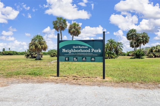 view of property's community with a yard