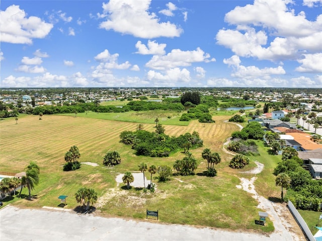 birds eye view of property featuring a rural view