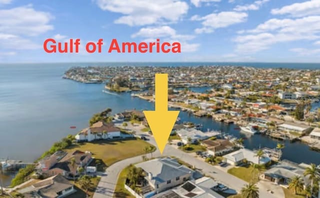 3912 Rudder Way, New Port Richey, FL 34652 - aerial perspective of suburban area with a large body of water