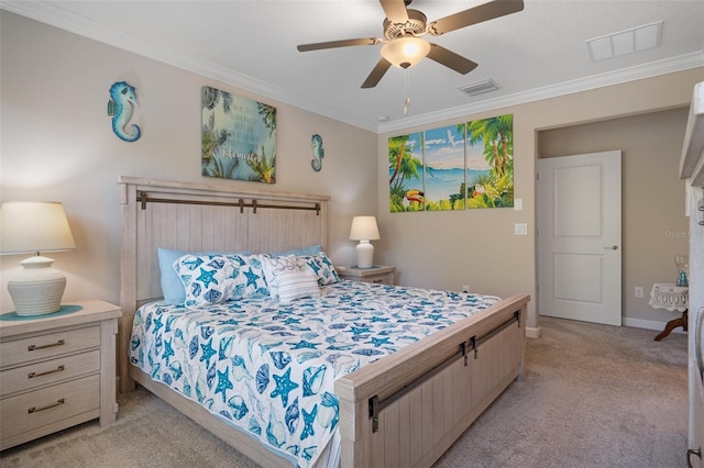 carpeted bedroom with ceiling fan and ornamental molding