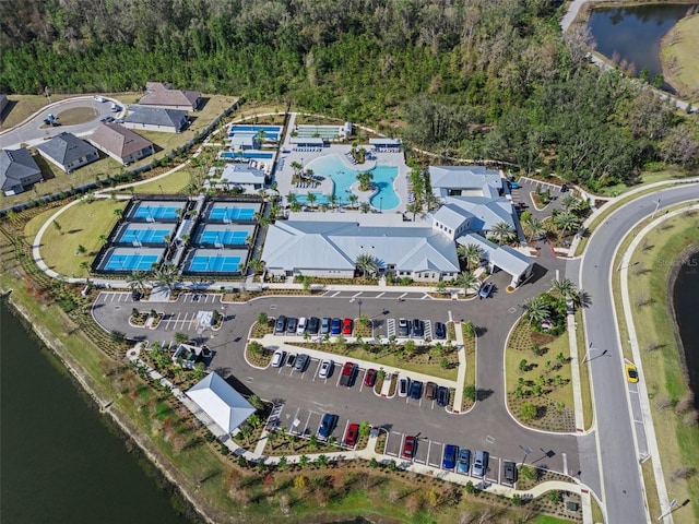 birds eye view of property featuring a water view