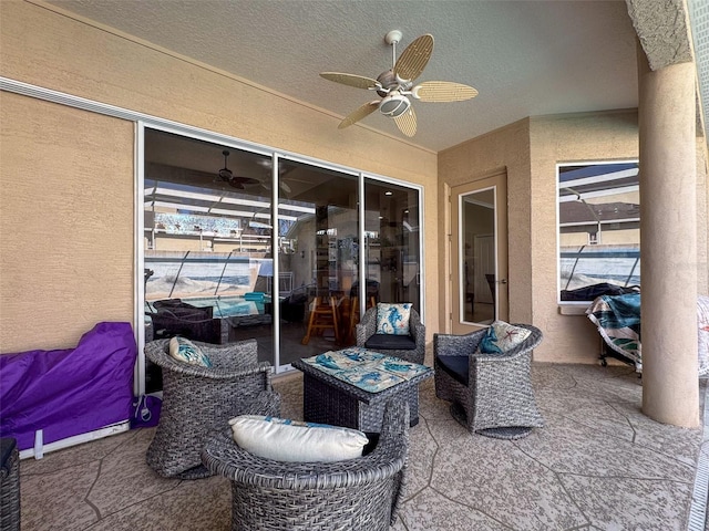 view of patio / terrace featuring an outdoor living space and ceiling fan