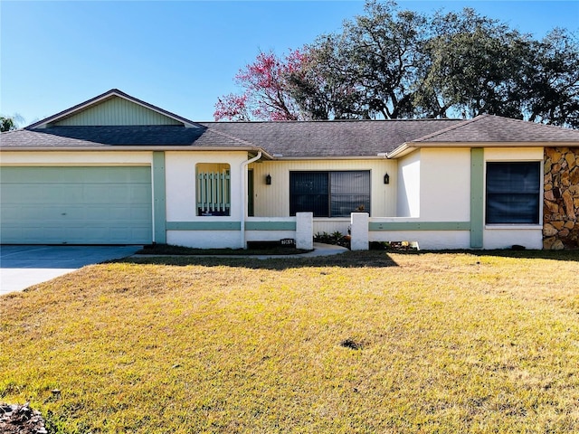 ranch-style house with a garage and a front lawn