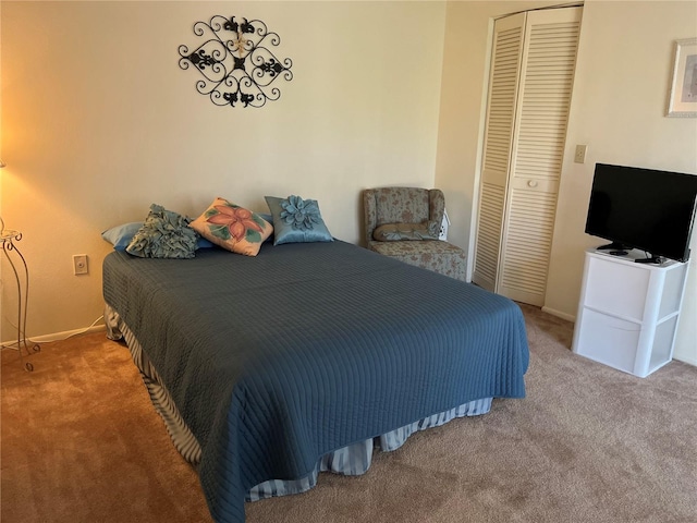 carpeted bedroom featuring a closet