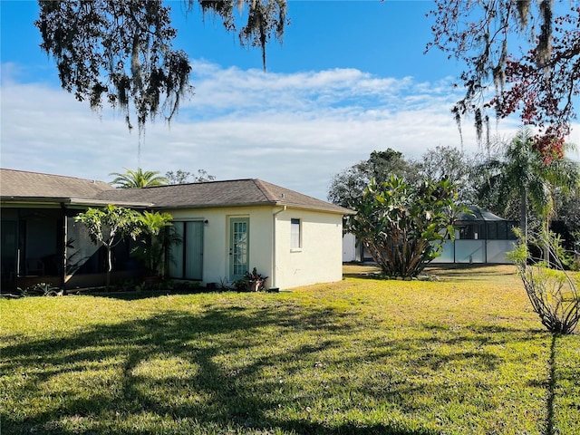 view of yard featuring a lanai