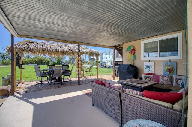 view of patio / terrace featuring an outdoor hangout area and grilling area