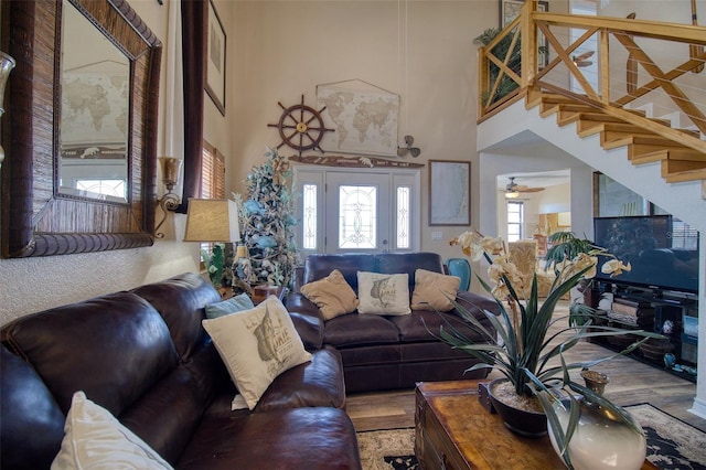 living room with a high ceiling