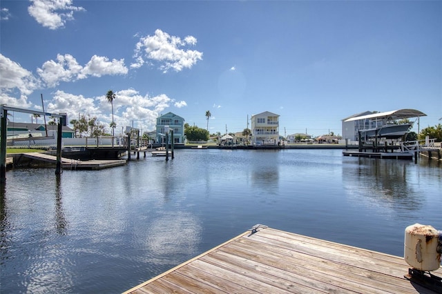 dock area featuring a water view