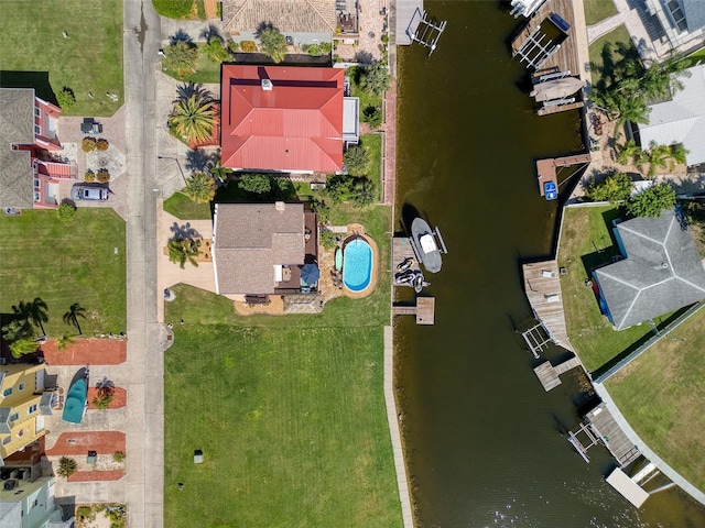 drone / aerial view with a water view