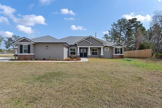 view of front of home with a front lawn