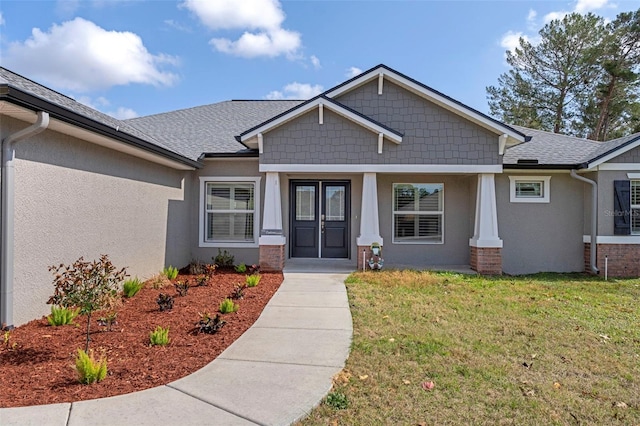 craftsman house featuring a front lawn