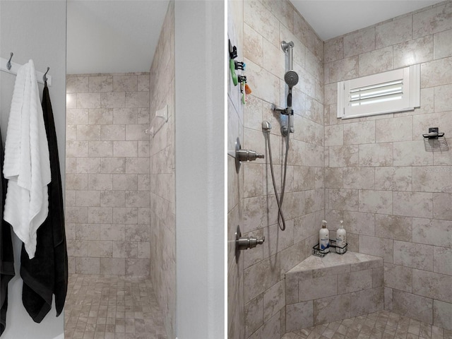 bathroom with a tile shower