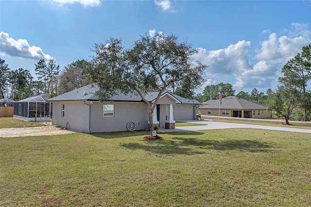 single story home featuring a garage, glass enclosure, and a front yard