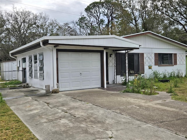 single story home with a garage