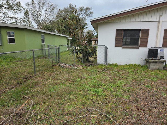 view of yard featuring central AC unit