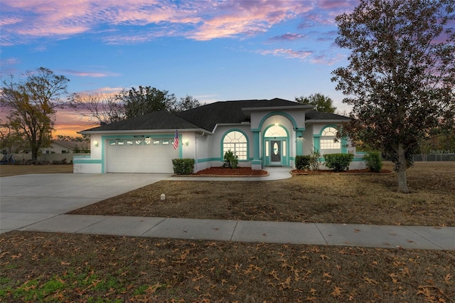 view of front of home with a garage