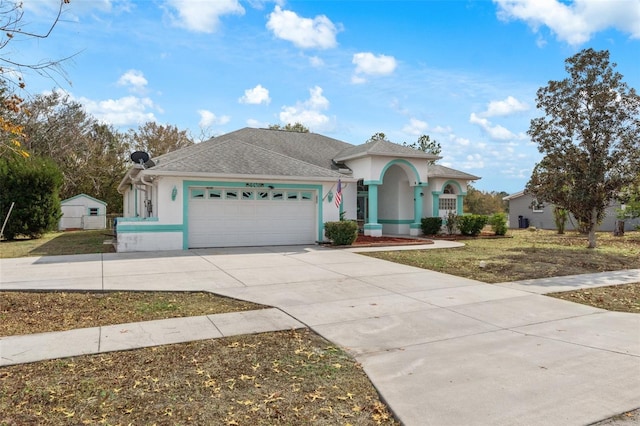 view of front of property featuring a garage