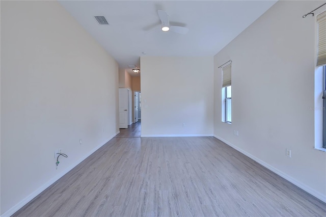 unfurnished room featuring light hardwood / wood-style floors and ceiling fan