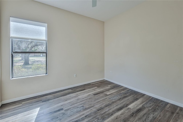 unfurnished room featuring hardwood / wood-style floors and ceiling fan