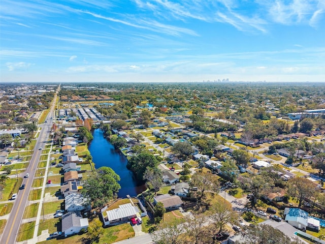 bird's eye view with a water view and a residential view