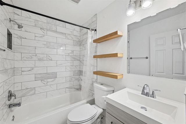 full bath featuring shower / tub combo with curtain, vanity, and toilet