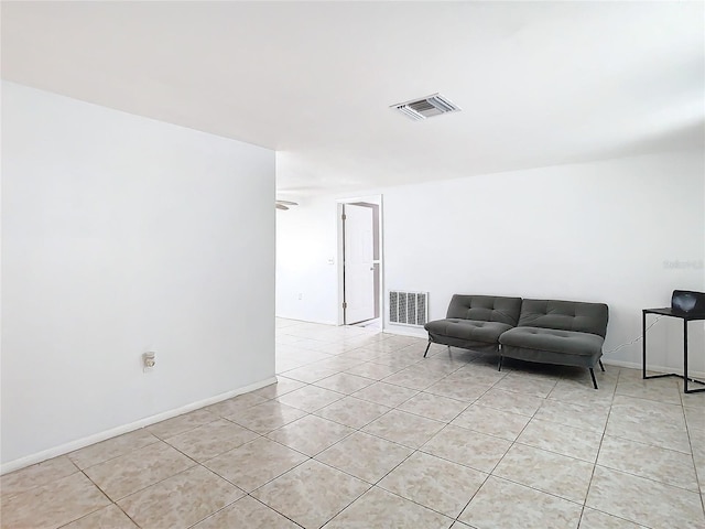 sitting room featuring light tile patterned floors