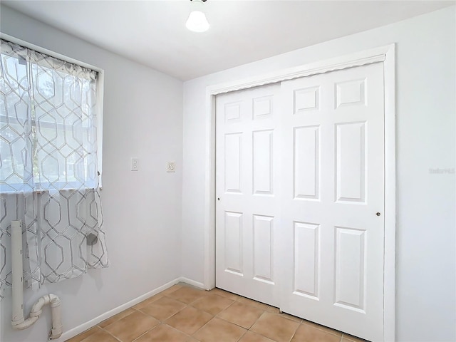 interior space featuring light tile patterned flooring