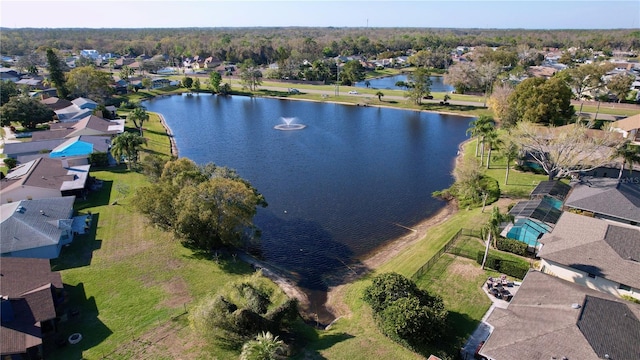 drone / aerial view with a residential view and a water view