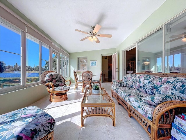 sunroom featuring a ceiling fan