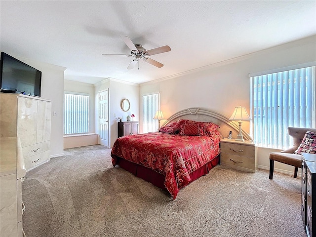 carpeted bedroom with multiple windows, ornamental molding, and a textured ceiling