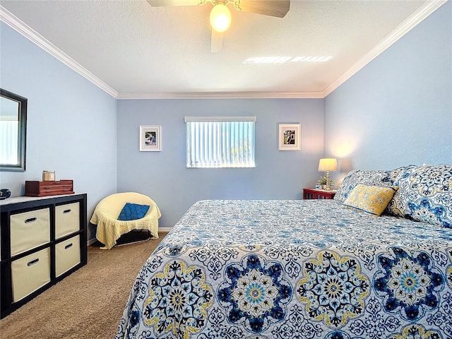 carpeted bedroom with a textured ceiling, ceiling fan, and ornamental molding