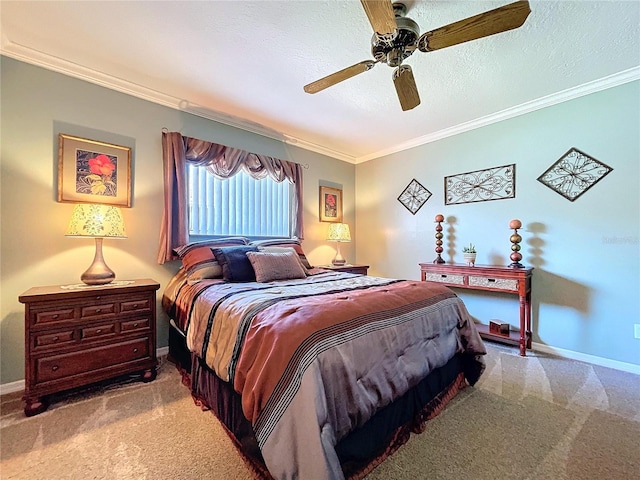 bedroom featuring ornamental molding, carpet flooring, a textured ceiling, and baseboards