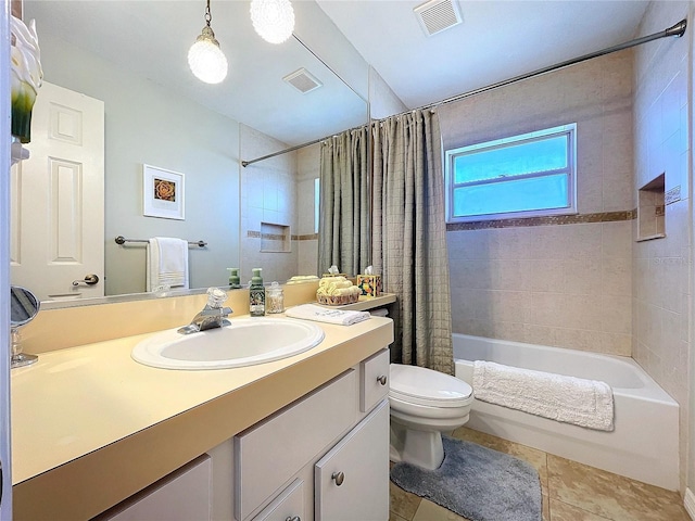 full bathroom featuring shower / bath combination with curtain, visible vents, vanity, and toilet