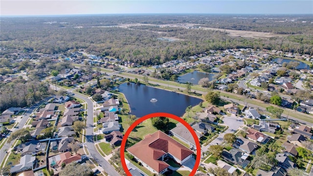 aerial view with a water view and a residential view