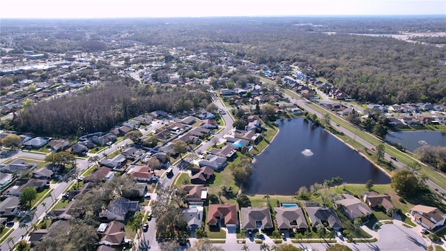 bird's eye view featuring a residential view and a water view