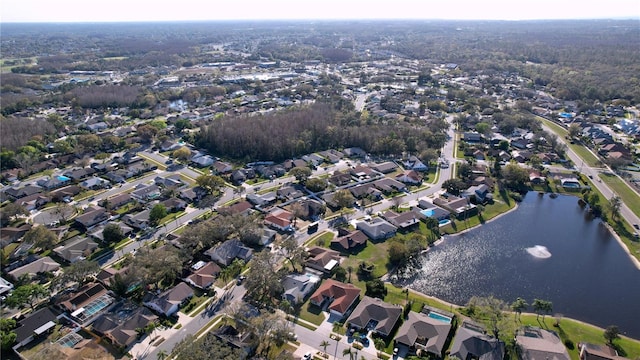 bird's eye view with a water view and a residential view