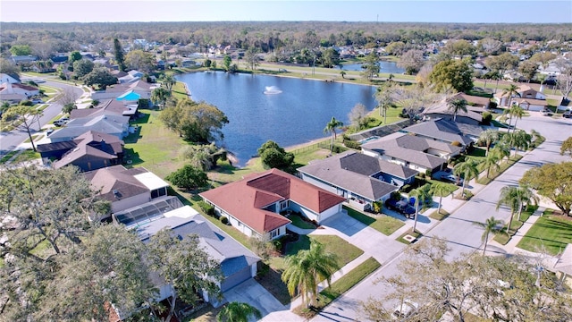 birds eye view of property featuring a residential view and a water view