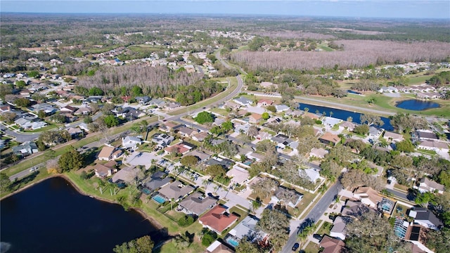 bird's eye view with a water view and a residential view