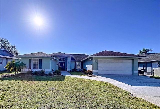 ranch-style house featuring an attached garage, a front lawn, concrete driveway, and stucco siding