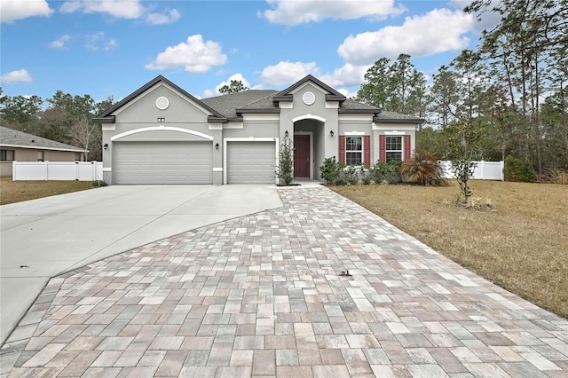 view of front of house with a garage