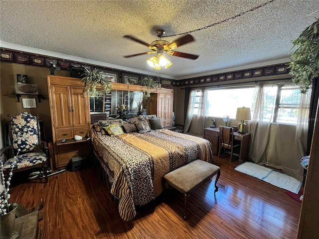 bedroom with crown molding, hardwood / wood-style flooring, and a textured ceiling