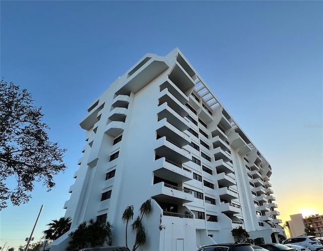 view of outdoor building at dusk