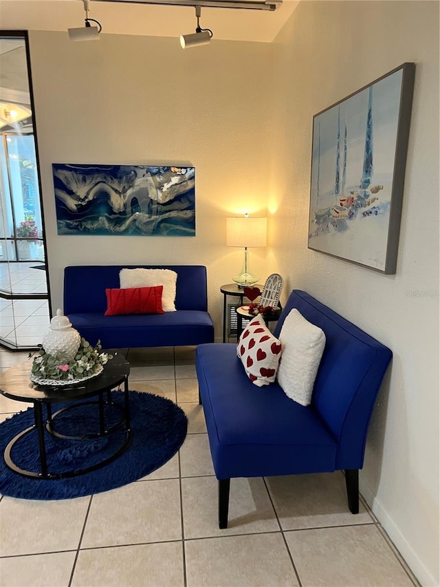 living room with tile patterned floors