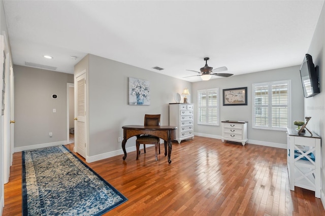 18819 Sunterra Dr, Land O Lakes, FL 34638 - sitting room with a ceiling fan, wood finished floors, baseboards, recessed lighting, and an office area