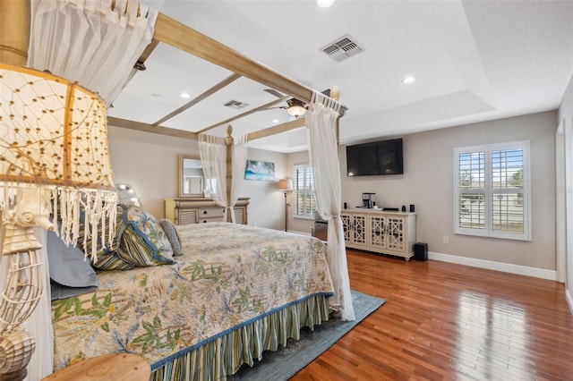 18819 Sunterra Dr, Land O Lakes, FL 34638 - bedroom with wood finished floors, baseboards, and recessed lighting
