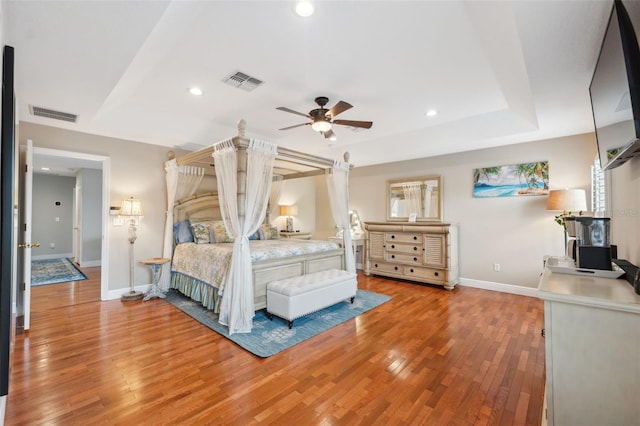 18819 Sunterra Dr, Land O Lakes, FL 34638 - bedroom with light wood-type flooring, baseboards, and recessed lighting